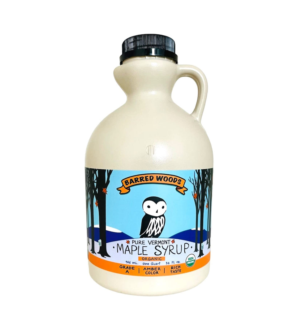Barred Woods maple syrup bottle pouring over pancakes for breakfast