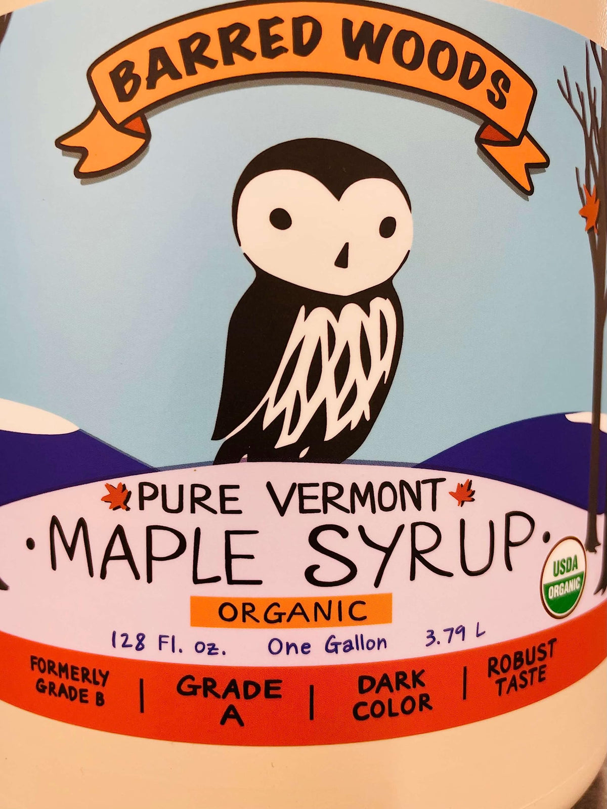 Barred Woods Maple Syrup bottle pour—perfect drizzle on pancakes.