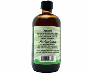 Close-up of Mint Julep mix in bottle emphasizes real cane sugar flavor.