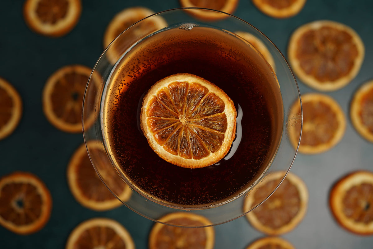 Barrel Roll orange slices at a party platter for festive citrus accents.