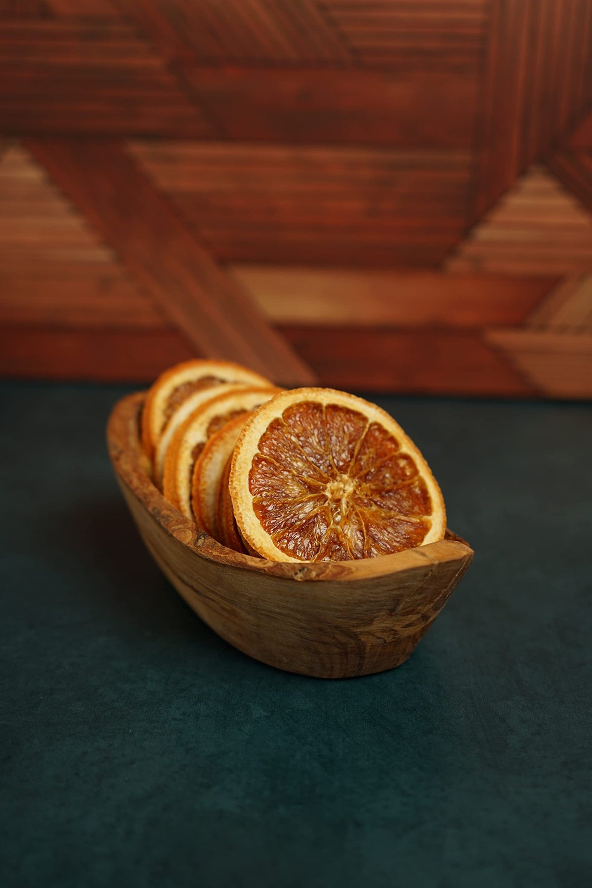 Barrel Roll orange slices adding natural citrus aroma to cocktails and mocktails.