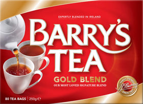 Barry's Tea Gold Blend steaming cup and saucer, inviting a cozy, energizing start.