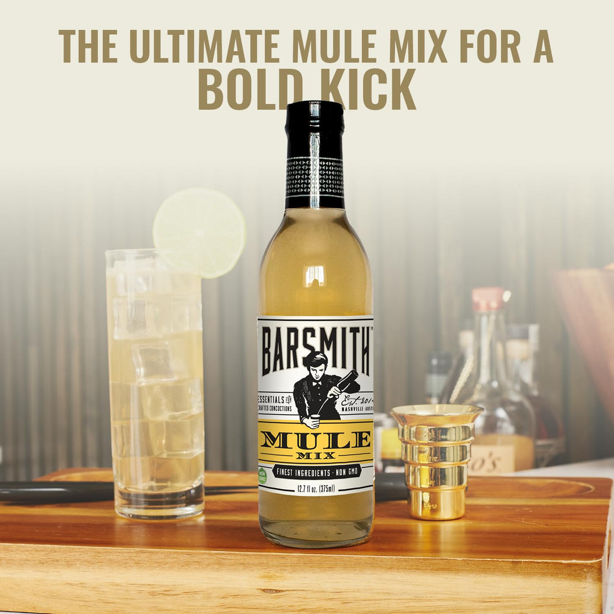 Barsmith Moscow Mule Honey-Ginger Mix bottle on ice with citrus.