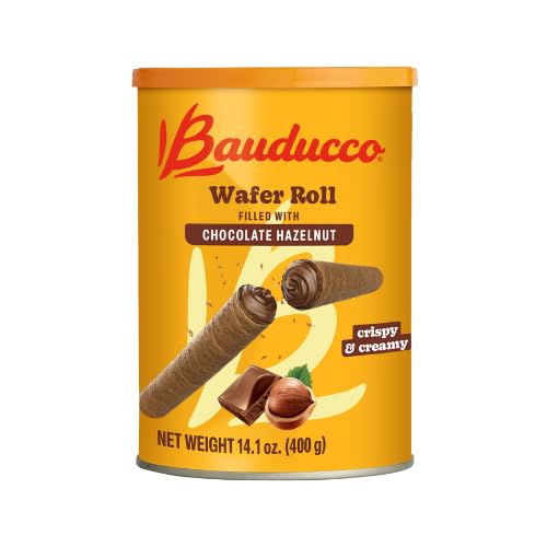 Bauducco wafer rolls closeup highlights creamy hazelnut filling with a smooth bite.