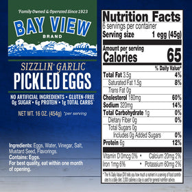 Bay View Brand pickled eggs in glass jar showing brine and chili kick.