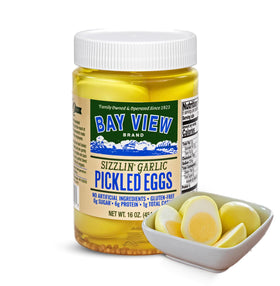Bay View Brand Sizzlin' Garlic pickled eggs in a glass jar, protein-packed snack.