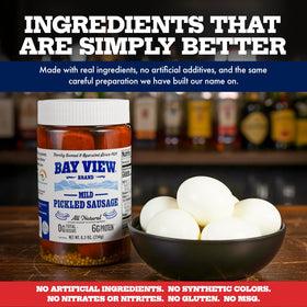 Bay View smoked pickled sausage cross-section reveals juicy texture and peppery brine