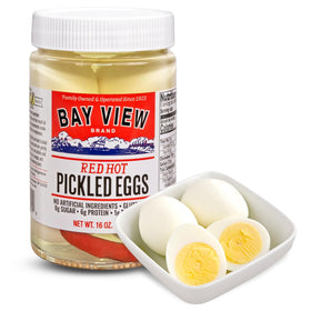 Bay View Pickled Eggs in red hot brine offer a spicy snack option.