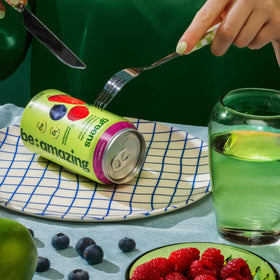 Be Amazing Greens Mixed Berry on-the-go packaging demonstrates portability.