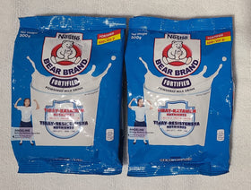 Bear Brand fortified powdered milk 2-pack front view, convenient nutrition for meals.