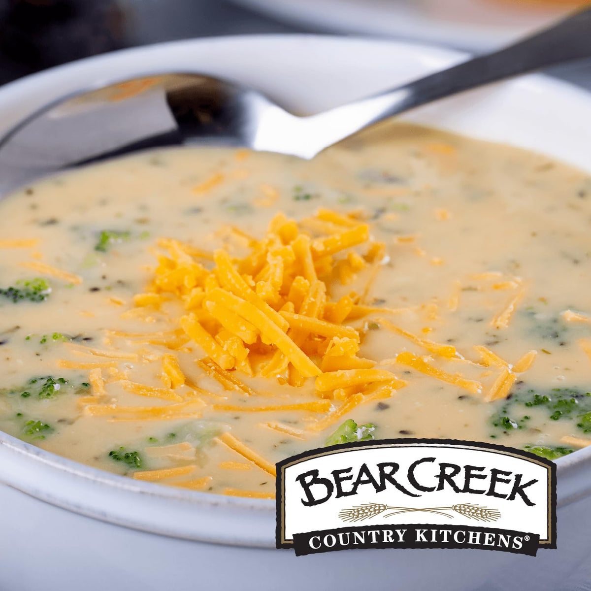 Close-up on Bear Creek label highlighting cheddar broccoli flavor