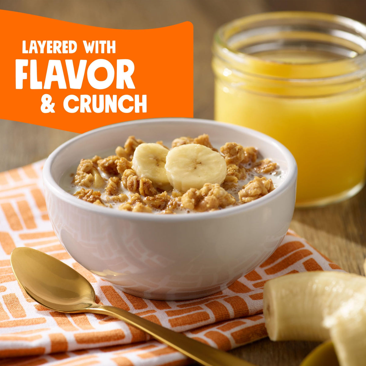 Breakfast bowl with Bear Naked Granola and honey, fueling busy mornings.