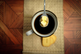 Bear Necessities honey sugar cubes pair with a cocktail glass for a honeyed touch.