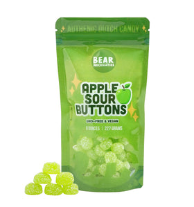 Bear Necessities Sour Buttons Apple flavor close-up highlights crisp taste and tangy coating for snacking.