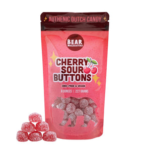 Bear Necessities Sour Buttons cherry bag close-up shows bold flavor and resealable convenience.