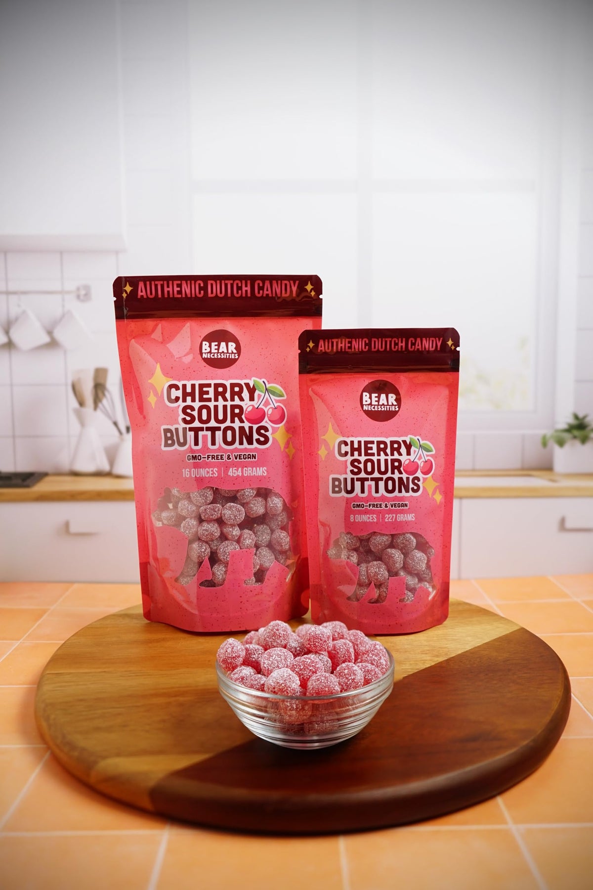 Bear Necessities Sour Buttons cherry sugar coating on plate hints at party-ready treat.