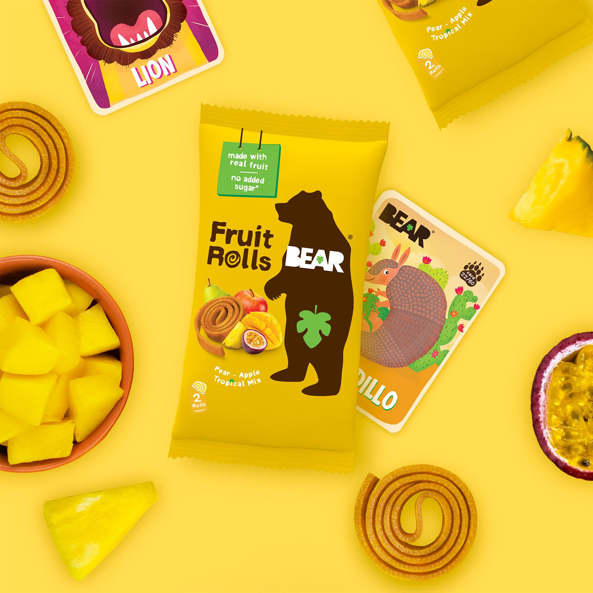 BEAR Tropical flavor rolls shown in a lunchbox for busy mornings and on-the-go.