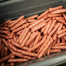 Bearded Butchers Country Style Seasoning being mixed into meat for consistent flavor.