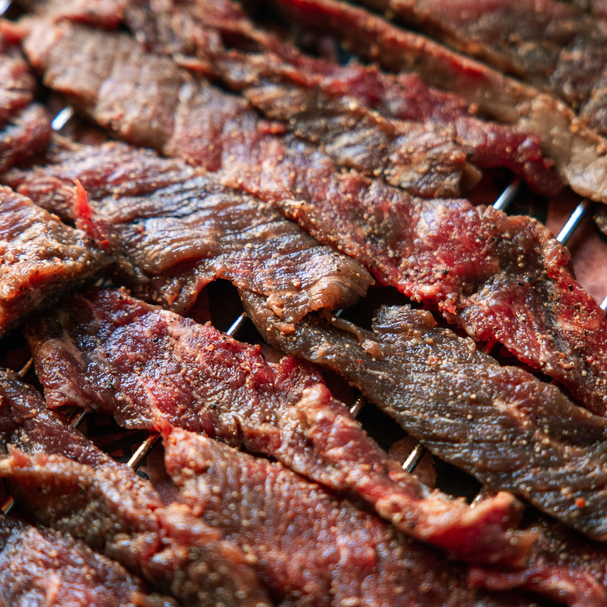 Finished Bearded Butchers jerky slices ready for a high-protein snack.