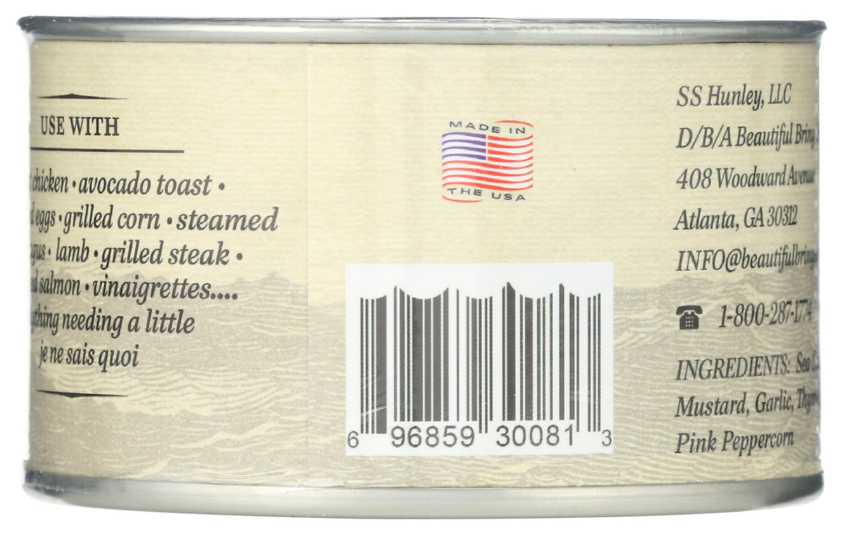 Beautiful Briny Sea French Picnic sea salt jar on shelf for easy access.
