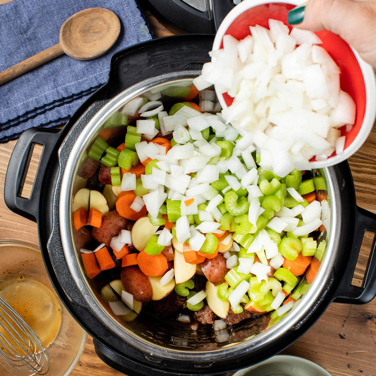 Beef, carrots, and onions prepped with McCormick mix for cozy weeknight stew.