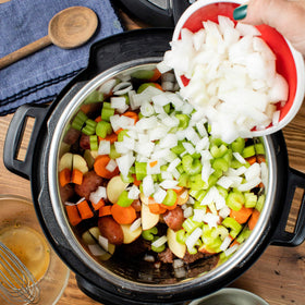 Beef, carrots, and onions prepped with McCormick mix for cozy weeknight stew.