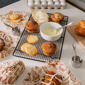 Bee's Wrap produce bag with Bakery Lane print replaces disposable bags.