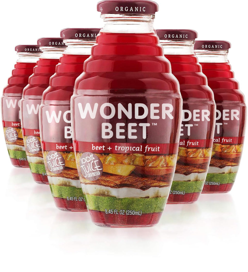 Beetology Organic Beet and Tropical Juice bottle close-up showing vibrant color and nutrient-rich appeal