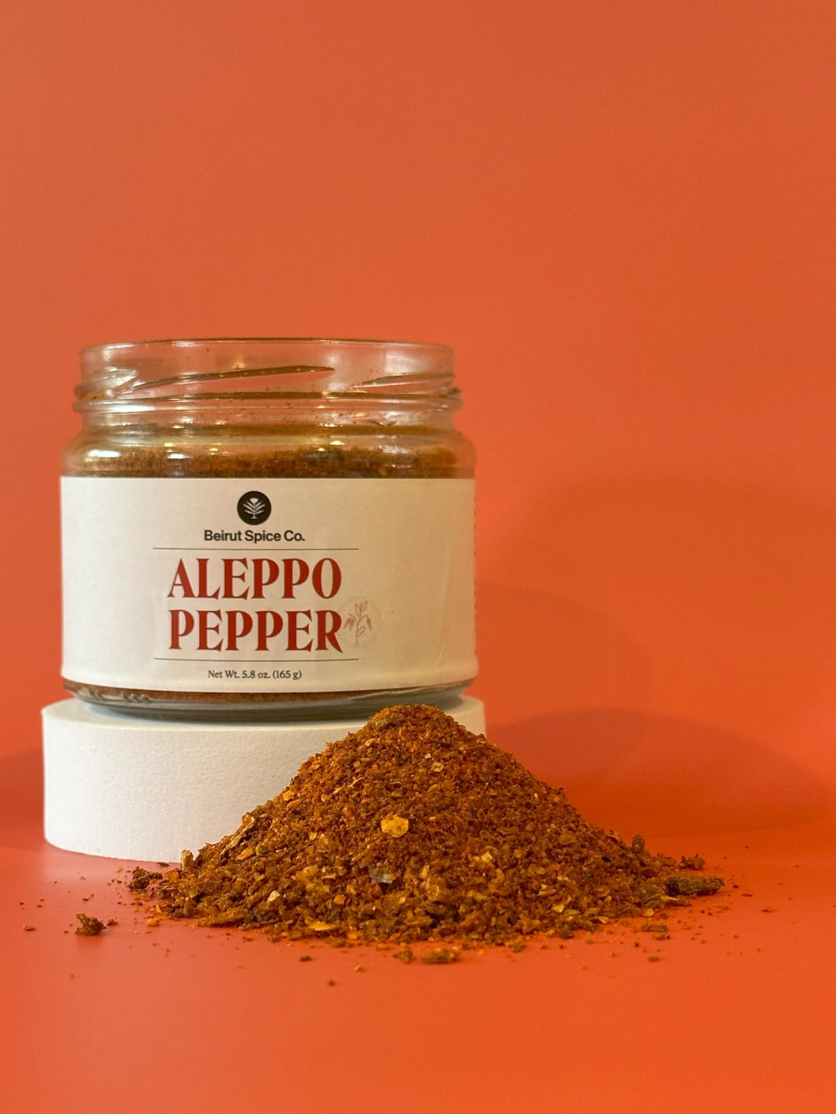 Beirut Spice Co. Aleppo Pepper Flakes closeup shows coarse texture for flavorful finishing.