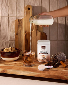 Bella All Natural Probiotics Cappuccino Coffee bottle on kitchen counter.