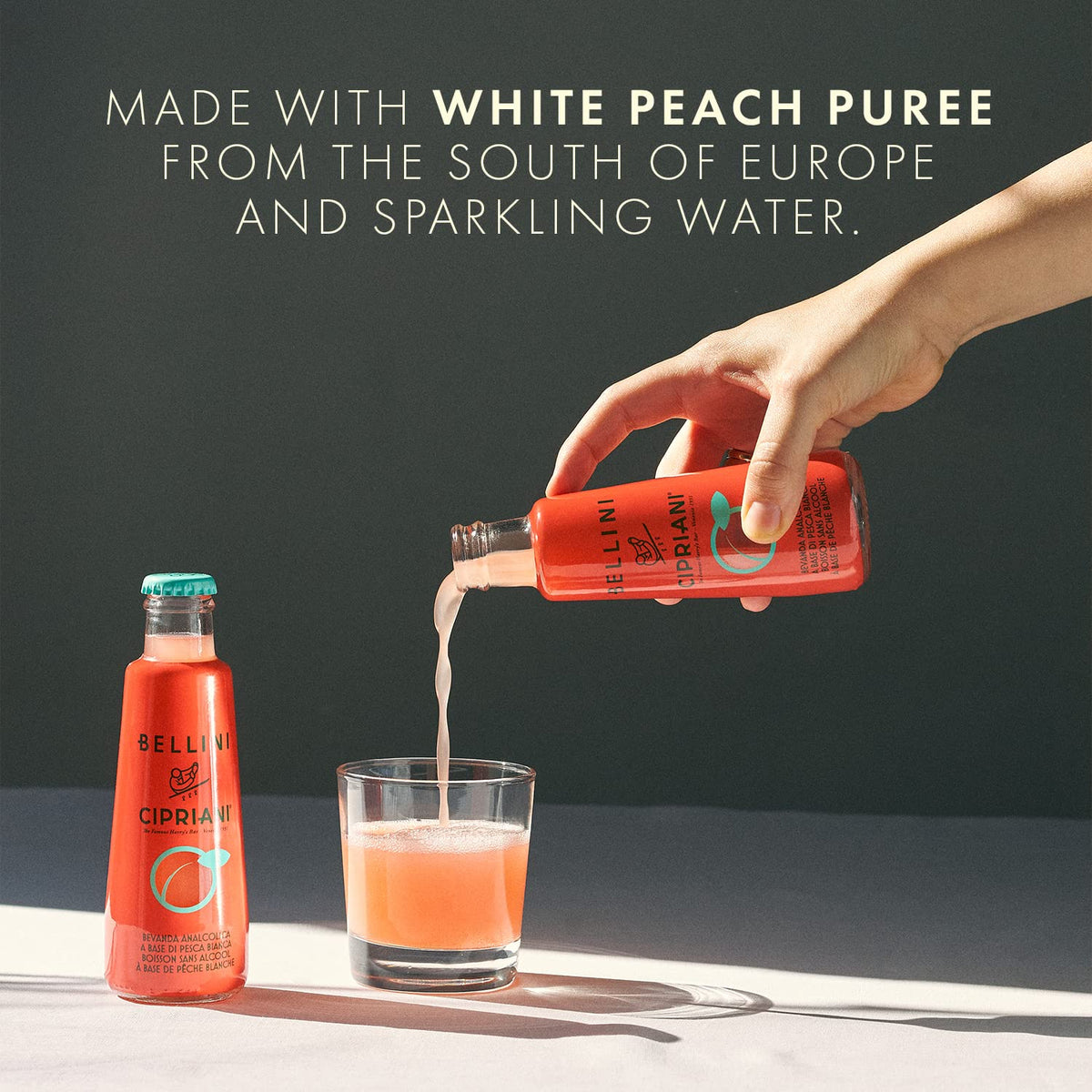 Bellini Cipriani ready-made glass with peach slice, ideal for non-alcoholic sipping.