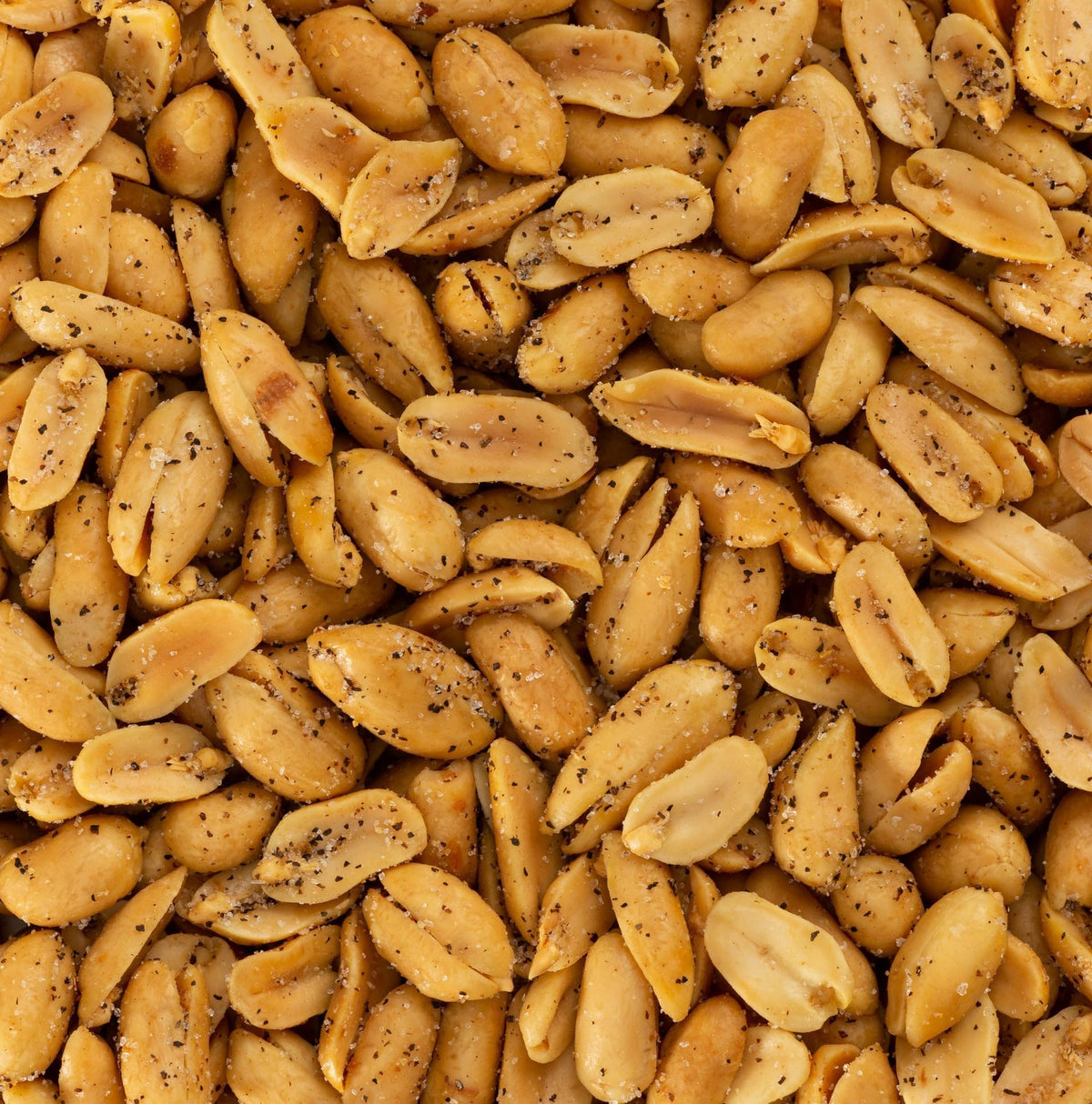 Hand-seasoned Belmont Peanuts signaling small-batch quality and artisanal care.