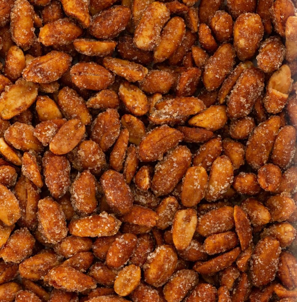 Light amber honey glaze gives a glossy finish to roasted peanuts.