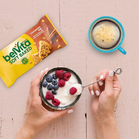 Belvita Cinnamon Oat with yogurt and fruit for a balanced morning.