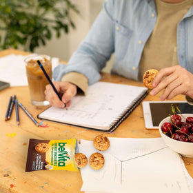 Belvita Energy Snack Bites on-the-go pack in a bag for portability.