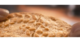 Belvita Soft Filled Chocolate Biscuits cross-section reveals creamy filling and wholegrain texture.