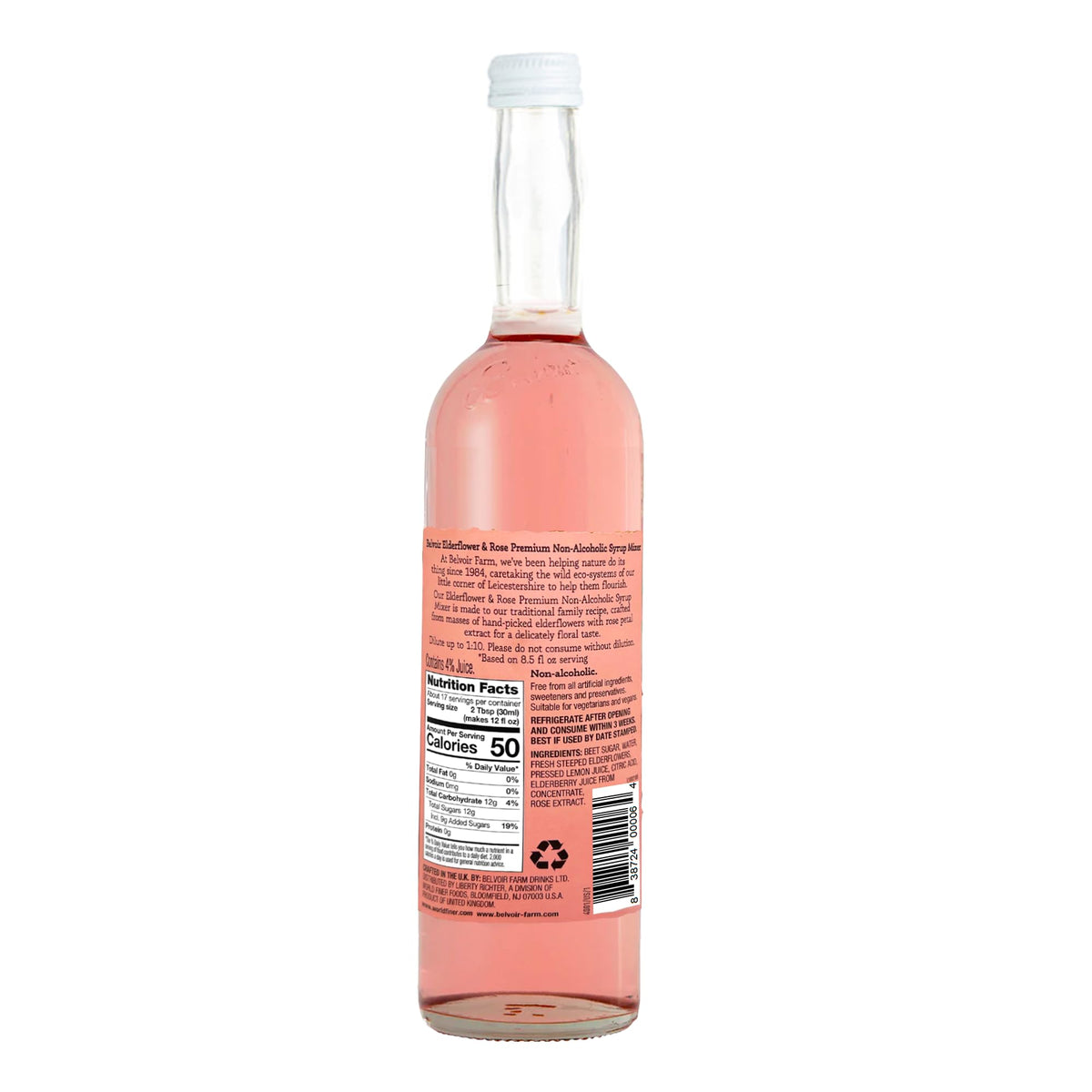 Belvoir Fruit Farms Elderflower & Rose Syrup bottle beside cocktail glass to suggest versatile mixer use.