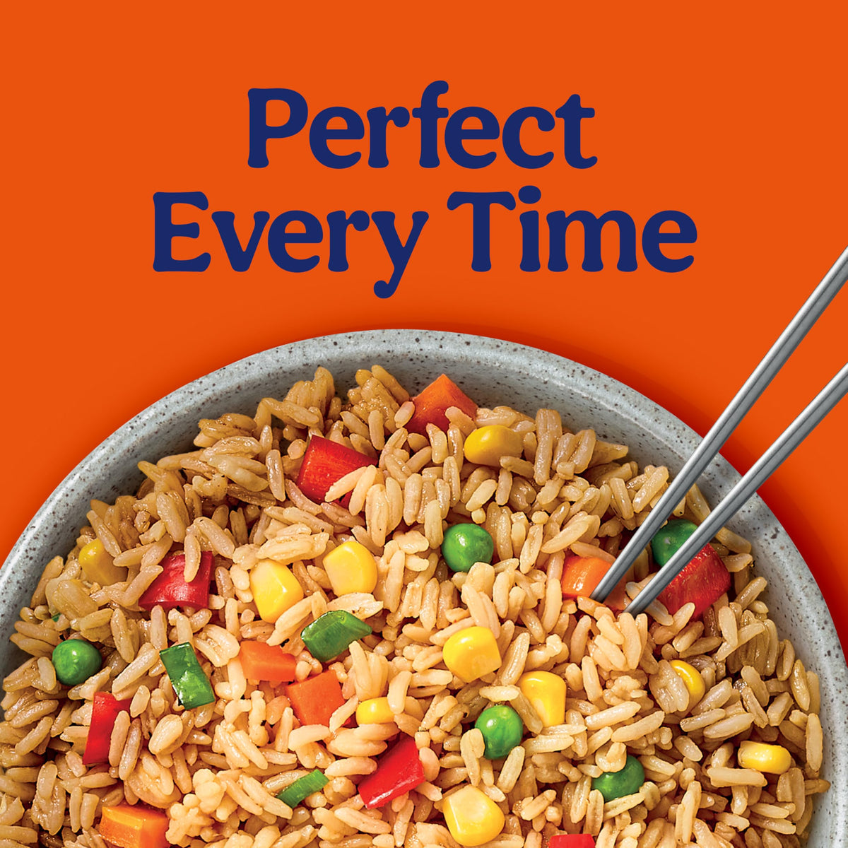 Steam rising BEN'S ORIGINAL Street Food Fried Rice with Vegetables bowl ready in 90 seconds.