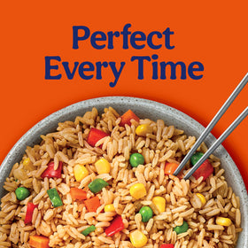 Steam rising BEN'S ORIGINAL Street Food Fried Rice with Vegetables bowl ready in 90 seconds.