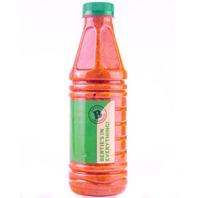 Bertie's bottle displayed with kitchen staples, suggesting versatile use in cooking.