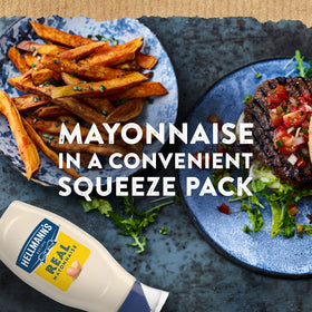 Best Foods Real Mayonnaise topping on a juicy burger.