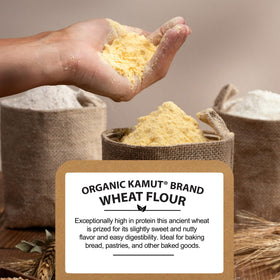 Be Still Farms Kamut Flour near kitchen counter with bread loaf in background