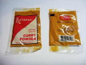 Betapac Curry Powder sachet pack—twelve portions ready to flavor Caribbean dishes.