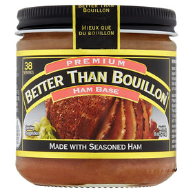 Pouring Better Than Bouillon Ham Base from the jar for easy seasoning