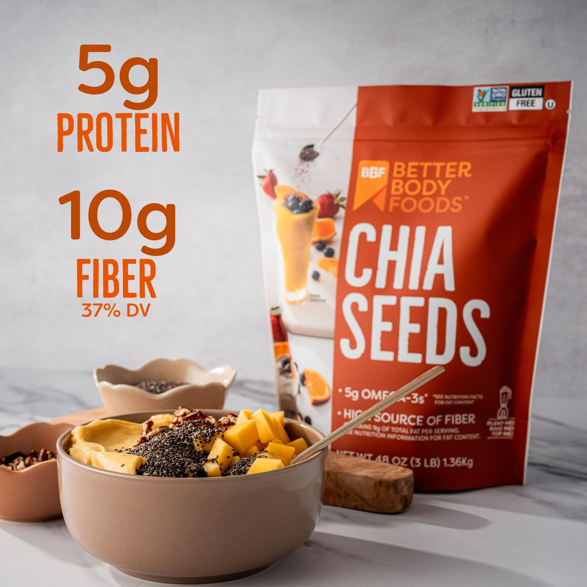 BetterBody Foods chia seeds on spoon over yogurt for fiber boost.