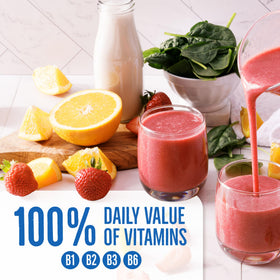 Powder pours into a shaker with BetterBody Foods Organic Energy Blend for a convenient workout boost.