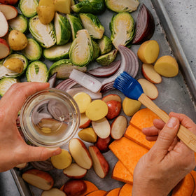 BetterBody Foods refined coconut oil in a pan demonstrates balanced heat tolerance for searing