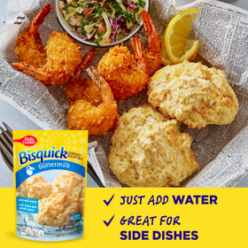 Freshly baked biscuits on a sheet from Betty Crocker Bisquick