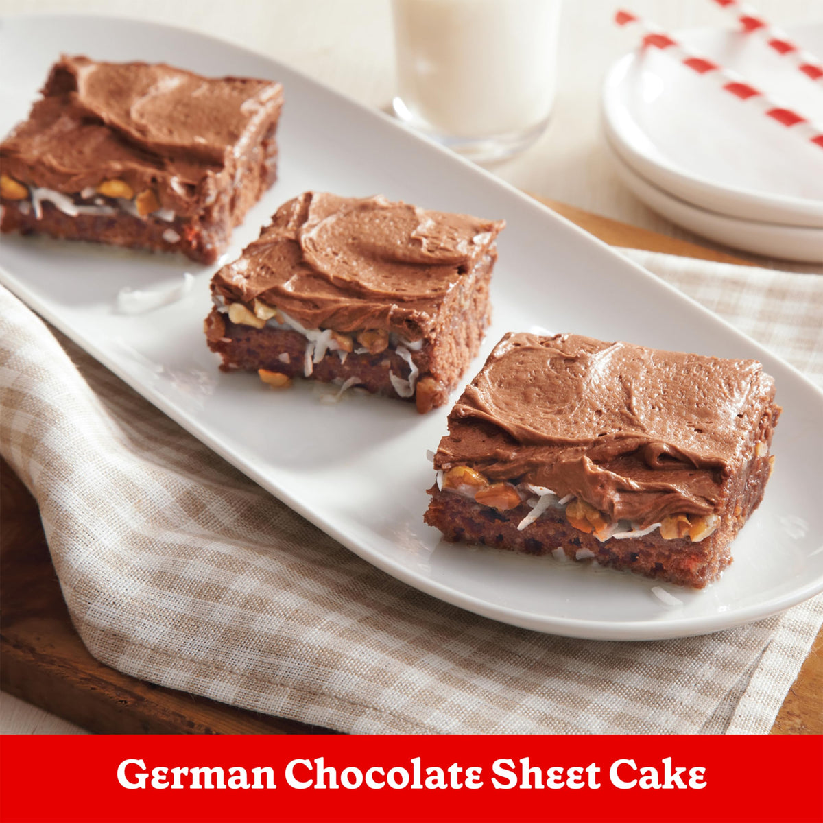 Finished German chocolate cake slice plated with Betty Crocker Delights.