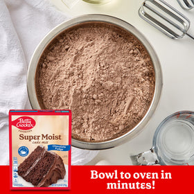 Chocolate fudge cake baking in oven filling kitchen with aroma